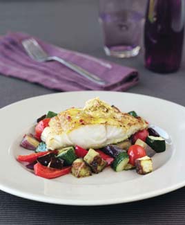 Baked Cod on Ratatouille with Curry Butter 